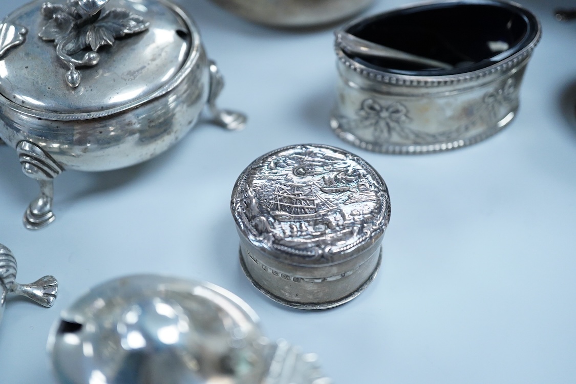 A collection of small silver wares to include a George V silver porringer, two George V silver sauce boats, a let Victorian silver sugar bowl, a George III silver goblet, with later embossed decoration, a George V small